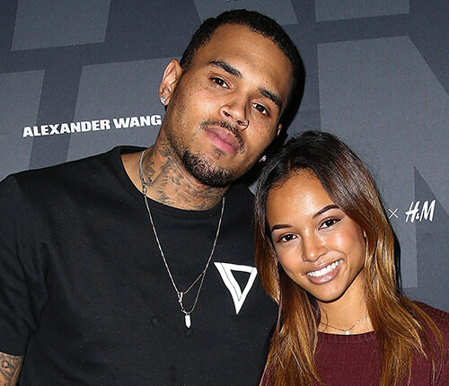 Chris Brown smiles at a public appearance ahead of welcoming his fourth child with Jada Wallace