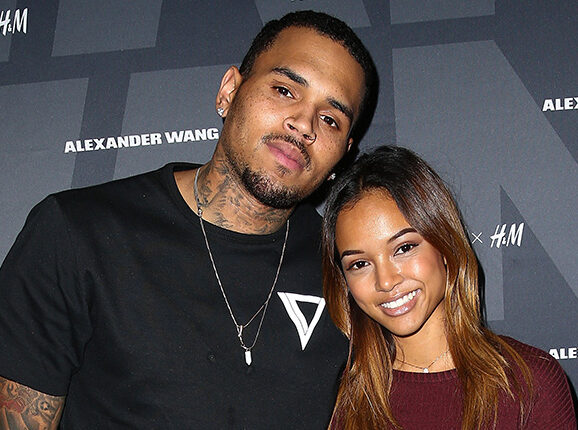 Chris Brown smiles at a public appearance ahead of welcoming his fourth child with Jada Wallace