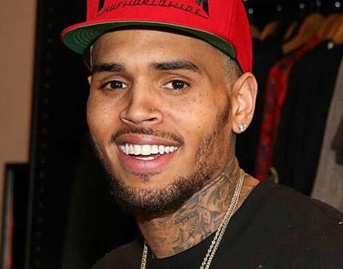 What led to gunfire near Chris Brown's LA home?